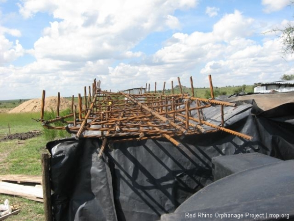 Some banding wire, and we have  the foundation reinforcements, which we put in the middle of the nine inches of concrete we poured which the stones rest on.