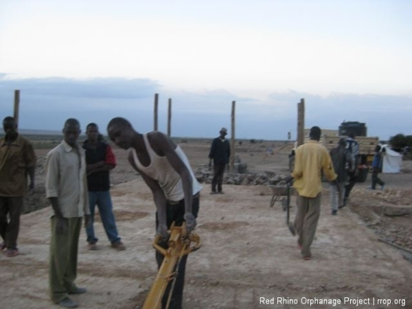 At the end of the very long day, we had this. All the sections brought up to the level of the slab we will pour on Tuesday. And Murafu trying his had with the muscle machine.