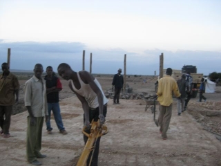 At the end of the very long day, we had this. All the sections brought up to the level of the slab we will pour on Tuesday. And Murafu trying his had with the muscle machine.
