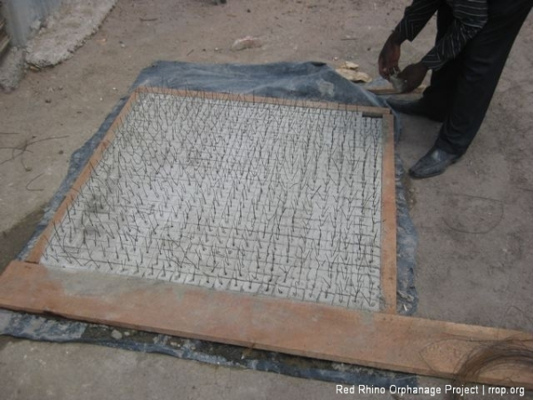 You may want to enlarge this one to see clearly. These small cement blocks will be separated and wired to the BRC from underneath to ensure a uniform depth of the BRC in the concrete slab.