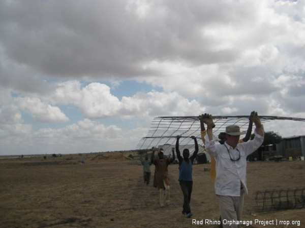 Then we made a conga line and carted it over to the slab area, which we had sprayed with anti-termite juice and covered with thick poly sheeting as a moisture barrier.