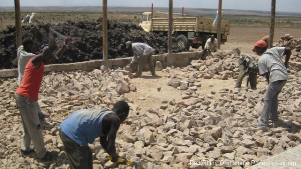 Meantime,  the guys finished the last hard core layer on the other side.