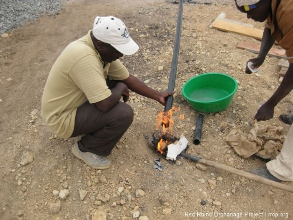 This is George, the electrician, using the same sophisticated heating element to improvise a connector that was accidentally left off the order.