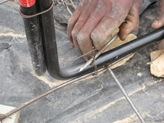 We use the same wiring method as with the BRC. A doubled, \"U\" shaped wire twisted with a large nail.