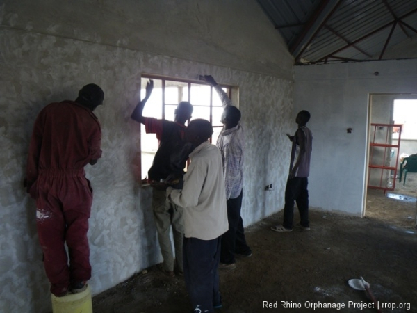 A lot of us. We filled them all and then sanded them with fine sand paper until the hard, cool wall was so very smooth.