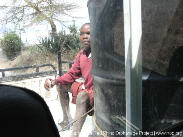 Peter and I on our way to Athi River for diesel fuel. Our first passenger.