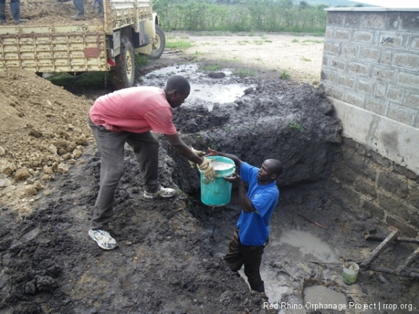 We had a one night break in the rain, so today was our chance. We bailed the last bits of water from the hole we had dug in the low point and made concrete patches backed by plastic barriers over the leakers.