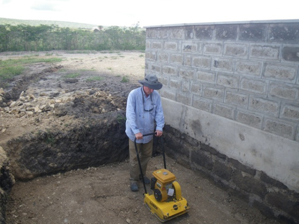 But we did manage to find some drier murram in our big pile, and get almost all the hole filled and compacted, and safe for now from subterranean subterfuge. It was a long, tiring, muddy, and, I guess you could say, a Holy Thursday.