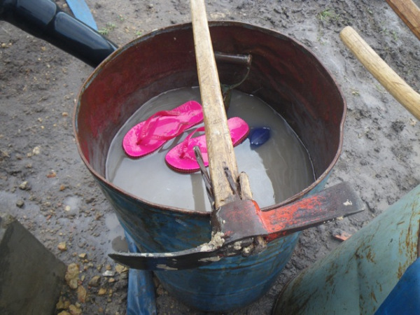 The collection barrel under the gutter's flow floated shoes better suited for today's work.