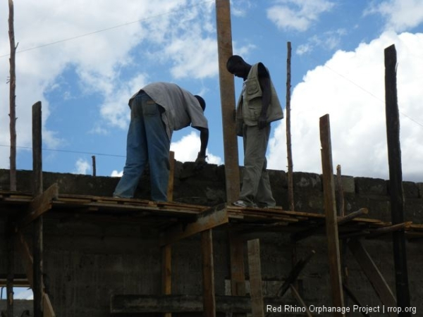 After the ring beam was poured and cured, we needed to build the gables, the triangular structures on each end of the building which dictate the angle fo the roof