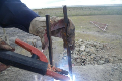 Peter attaching a U bolt in the ring beam that the trusses will be welded to.