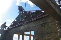 We hoisted up one of the trusses to prescribe the exact height and angle of the gable.