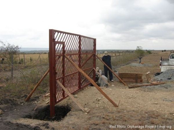 and the gate was happy and beginning to feel its purpose for the first time.