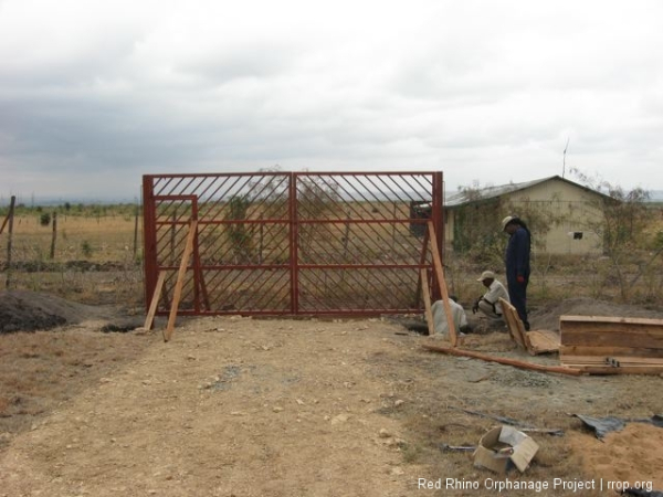 The rectangular inset on the left side is a door which can open independently of the whole gate, for foot traffic.