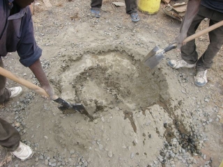 Then you hollow a crater in the top and begin to pour water in, slowly.