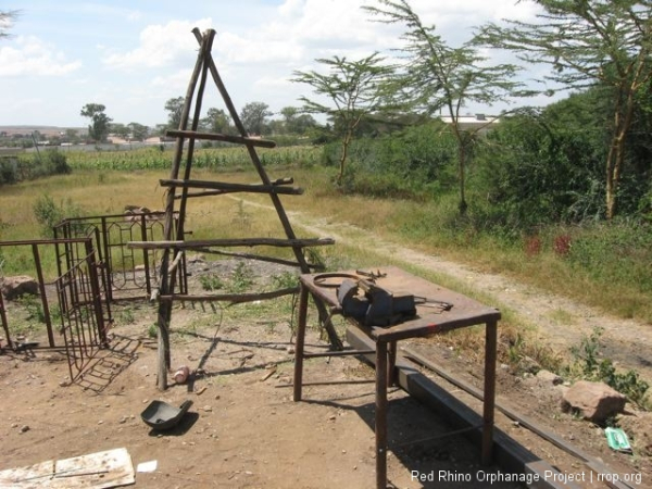 The great design for homemade ladders here, and the steel work table.