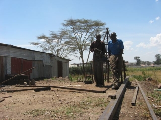 This is the Pastor Edward\'s welding shop in Athi River, where I contracted to have the heavy metal gate I had designed, fabricated.