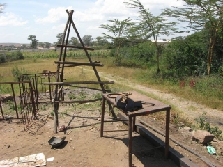 The great design for homemade ladders here, and the steel work table.