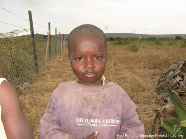 He\'s third of four, about three years old, I would guess. Now that their mother has a job in Daystar, he is often left to care for his one year old sister about half the day, while the two oldest are in school. We keep an eye on them.