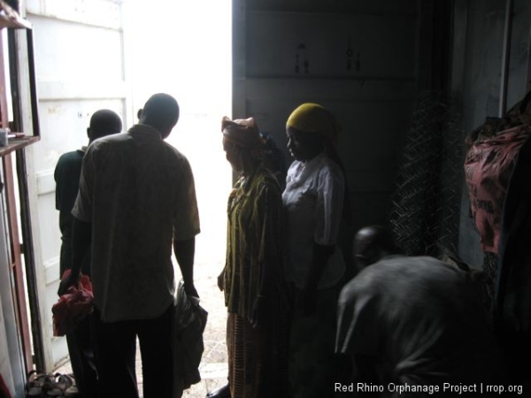 While the rest of us rode out the brief shower in the container. Agnes, Mbini, Rosalie, Gilbert, Moses, Benson and I. It has been very dry and the cattle are  beginning to be in some jeopardy. This was very small and not efficacious rain.