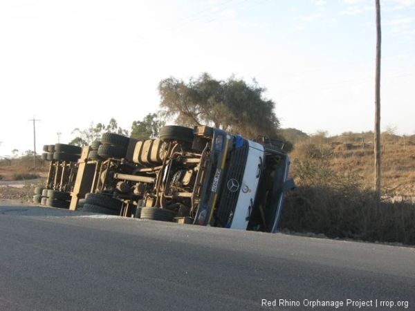 His labors over for a while, he was resting quietly beside the newly opened stretch of the Mombasa Road between Athi River and Lukenya