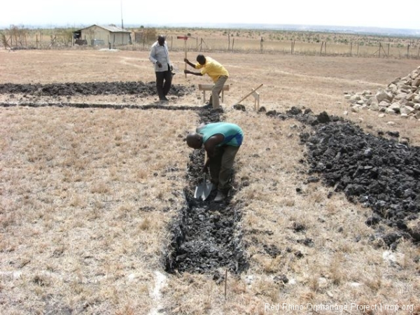 and then shoveling out the chunks, a trench began to take shape.