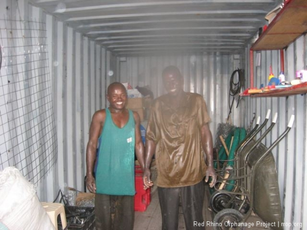 Not everyone got in on time. Gilbert and Benson spread plastic sheeting over our made bricks and got this for their trouble.