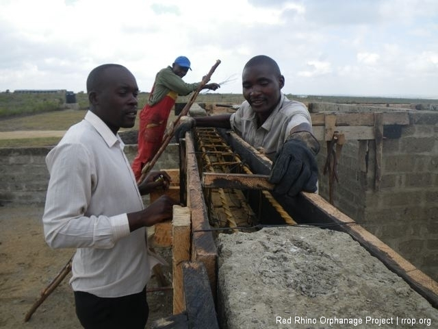 Murafu keeps it all honest with his measuring guide, cut just a couple millimeters short of 200 to allow for the slight expansion when the weight of the concrete is added and vibrated.