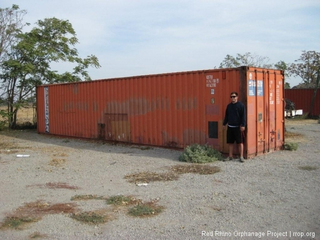 3/5/09: This 40' container may not look so mobile right here, but it's about to be loaded with all manner of good stuff and shipped around a few oceans until it arrives in the Indian Ocean at the port of Mombasa. Then it will be trucked the several hundred miles t us and off loaded with a crane at it's new home, our patch of ground in Lukenya. Joe, Pat's son, shown here, is not making the trip, he's staying behind to keep an eye on his dad.