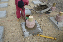 Each of our 180 paving slabs gets one of the pilings.