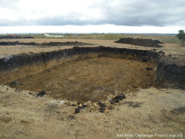 and excavating the foundation space for the next two buildings,