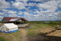 If we turn around and look back from where we're standing, this is what we'd see. The kitchen, the tent and part of on of the foundations for the kid's future houses.