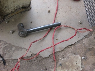 The welding machine was down, so he couldn\'t cut it with his torch, and his hammer wasn\'t going to do us much good.
