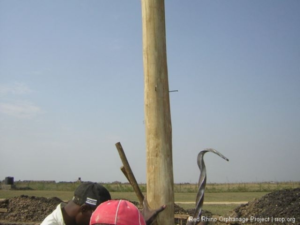 And then hung plumb bobs from the nails at right angles on them to make sure they were obeying.